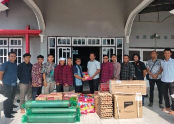 Sat Intelkam Polres Paser berfoto bersama pengurus DPD LDII Kabupaten Paser dalam kegiatan silaturahmi dan sinergi Kamtibmas, yang dirangkai dengan penyaluran dukungan sarana guna mendukung aktivitas organisasi.